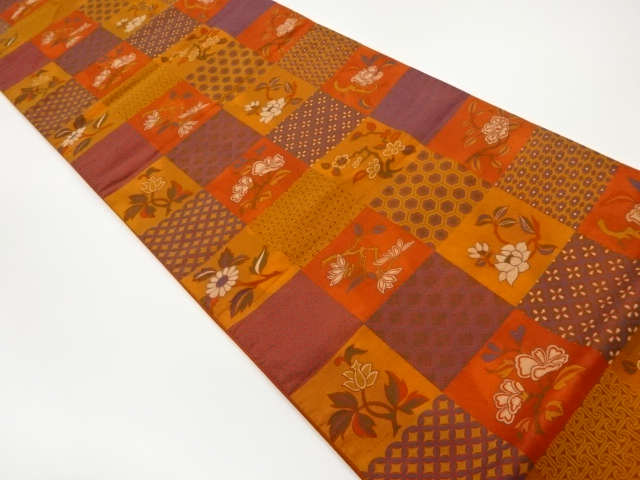 色紙に花・枝葉・古典柄模様織出し洒落袋帯